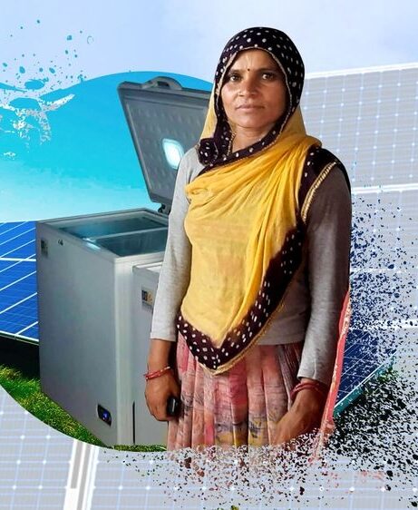 Woman entrepreneur with her DDSolar solar refrigerator